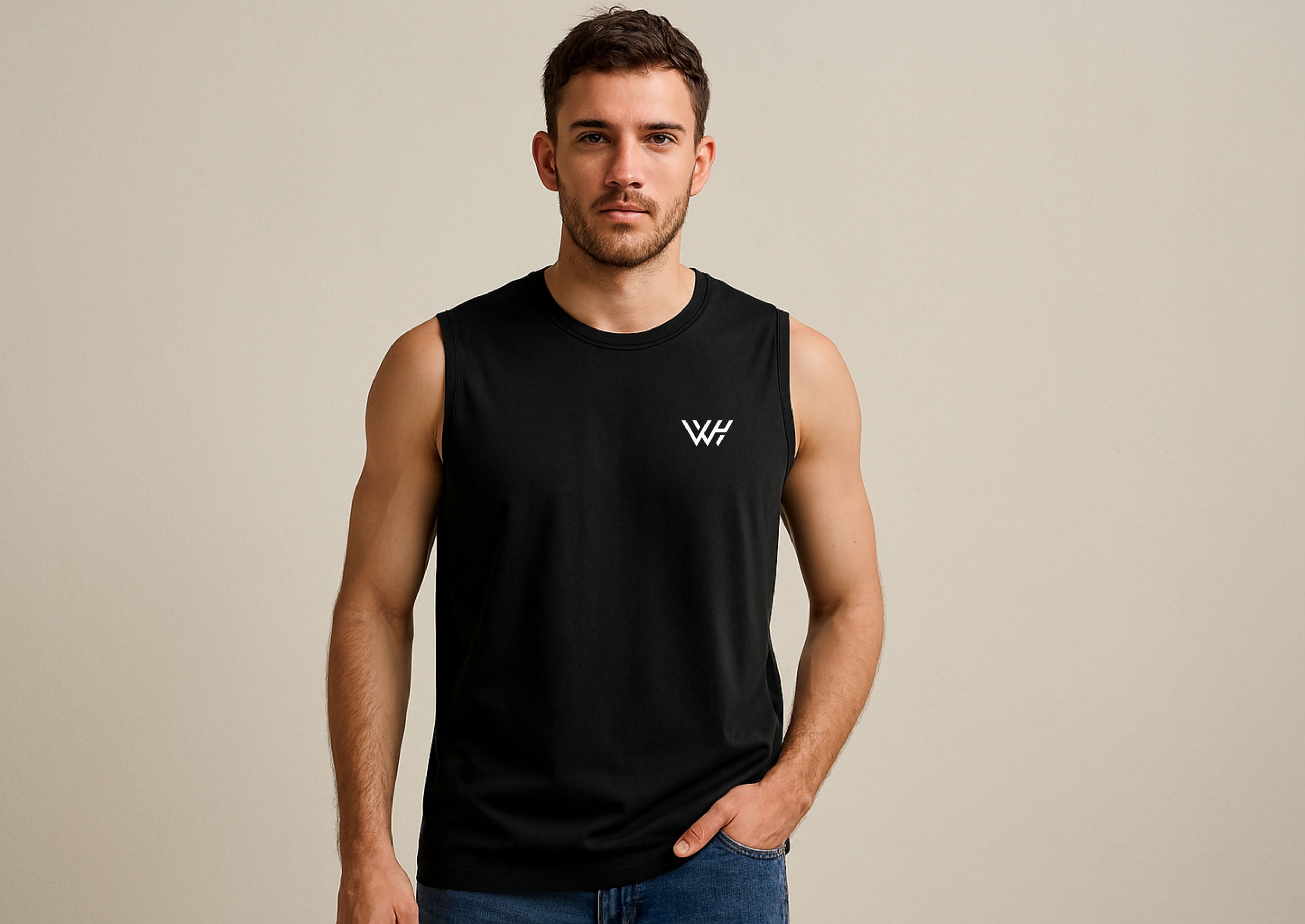 Man wearing a black sleeveless shirt with a logo on a beige background