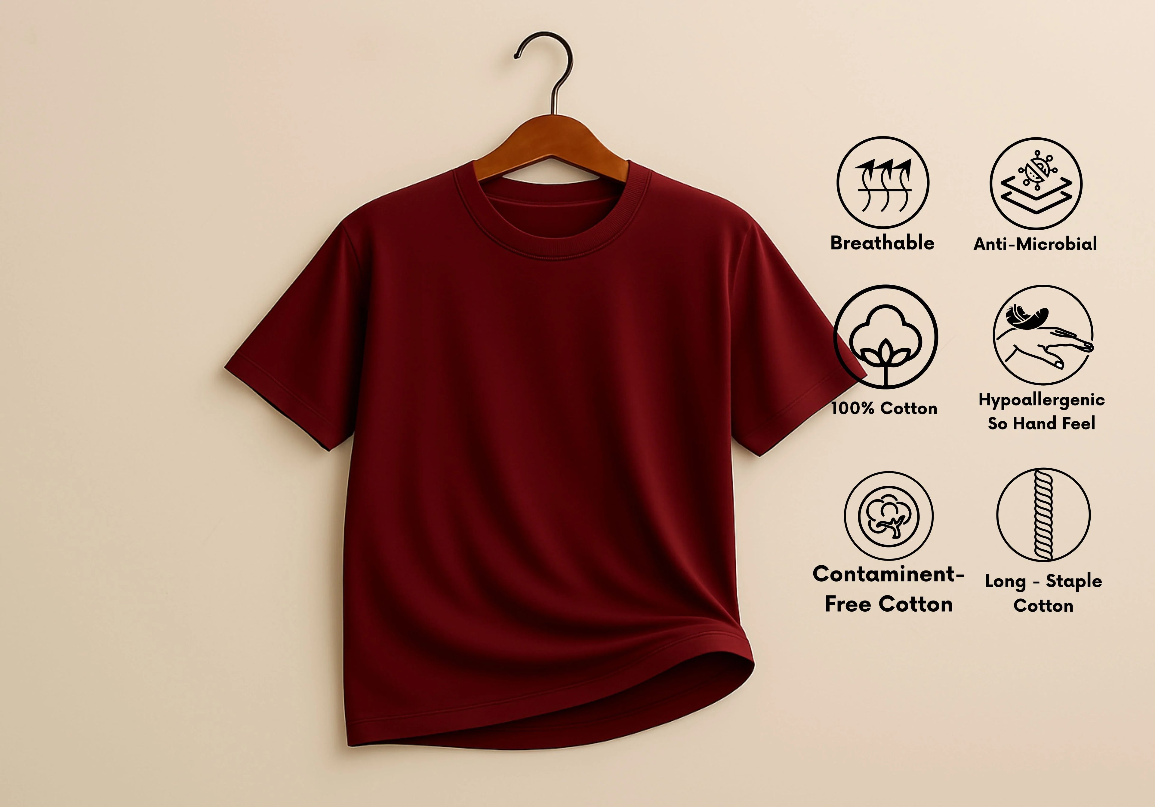 Maroon t-shirt on a hanger with health and comfort features listed on a beige background